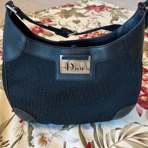 Christian Dior. Original owner  black good size for party dress. 100% Authentic